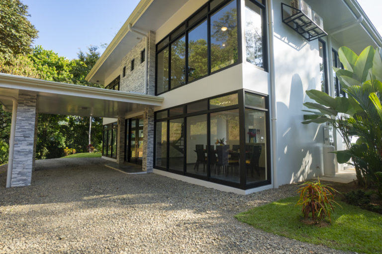 Drive through the portico for ample parking