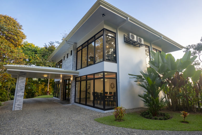Drive through the portico for ample parking